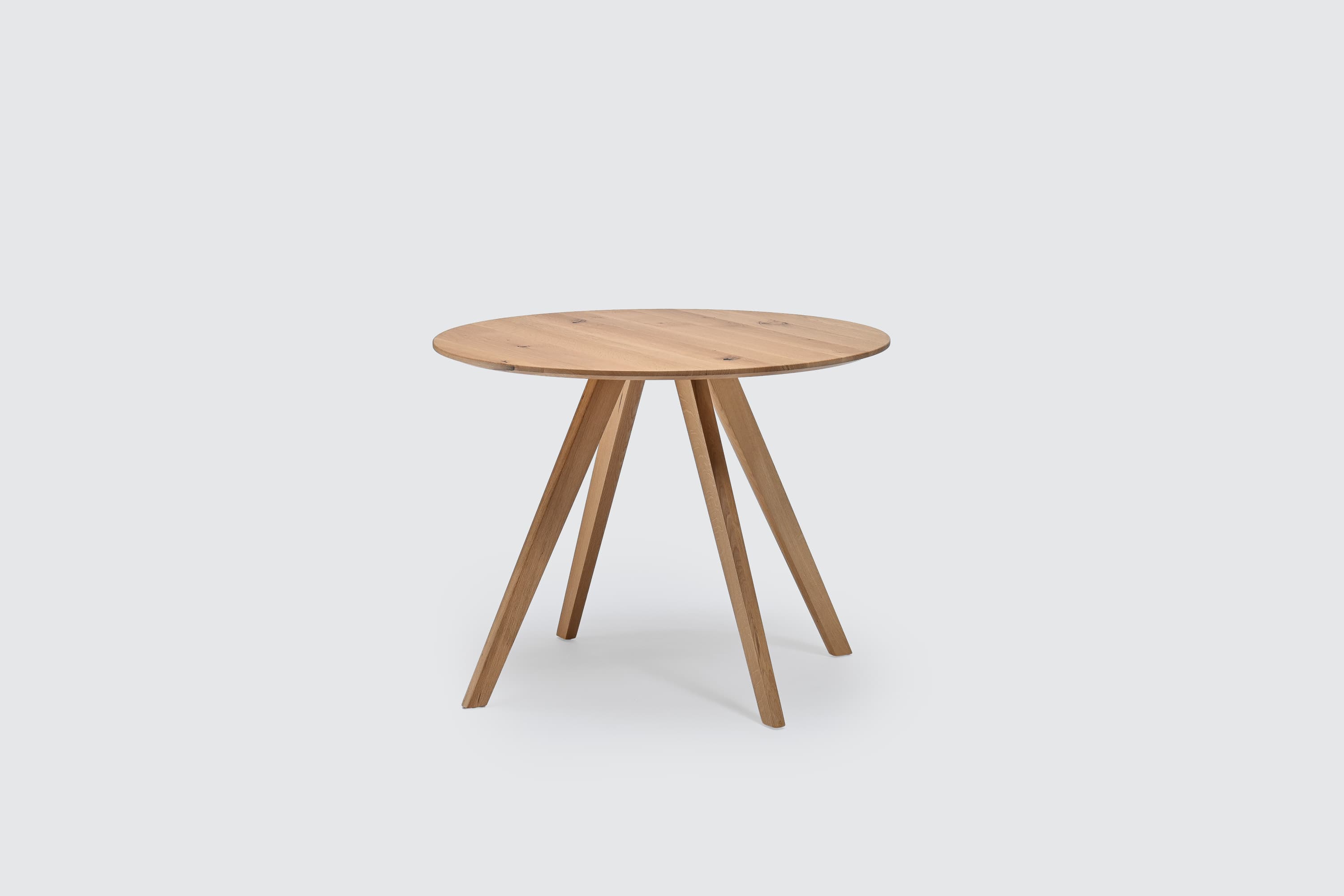Round circular solid oak dining table with wooden legs